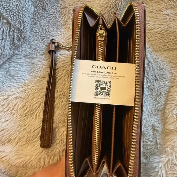 Coach Long Zip Around Wallet
In Signature Canvas - Picture 12 of 15